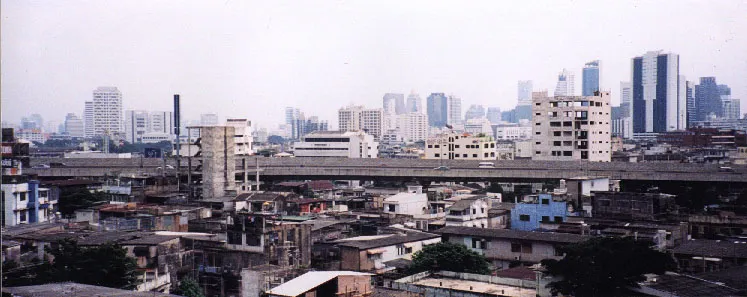Bangkok skyline showing houses, freeways and skyscrapers